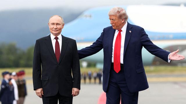 U.S. President Donald Trump stands with Russian President Vladimir Putin, as they meet to negotiate for an end to the war in Ukraine, at Joint Base Elmendorf-Richardson in Anchorage, Alaska.