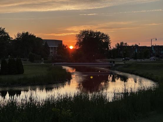 Stream in the foreground of a sunset 
