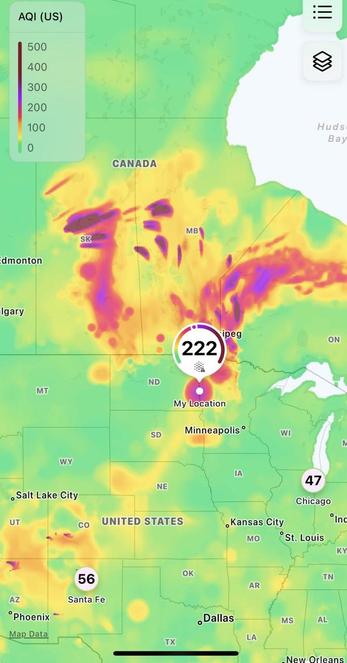 Map of air quality showing poor air quality over parts of Saskatchewan, Manitoba and Ontario (Canada), including the border area between North Dakota and Minnesota (USA). Current location is labeled 222.