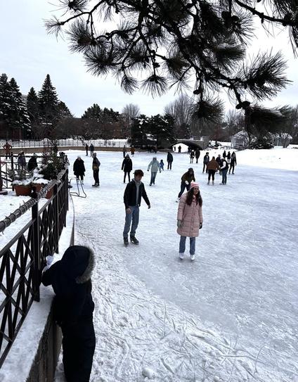 People ice skating.