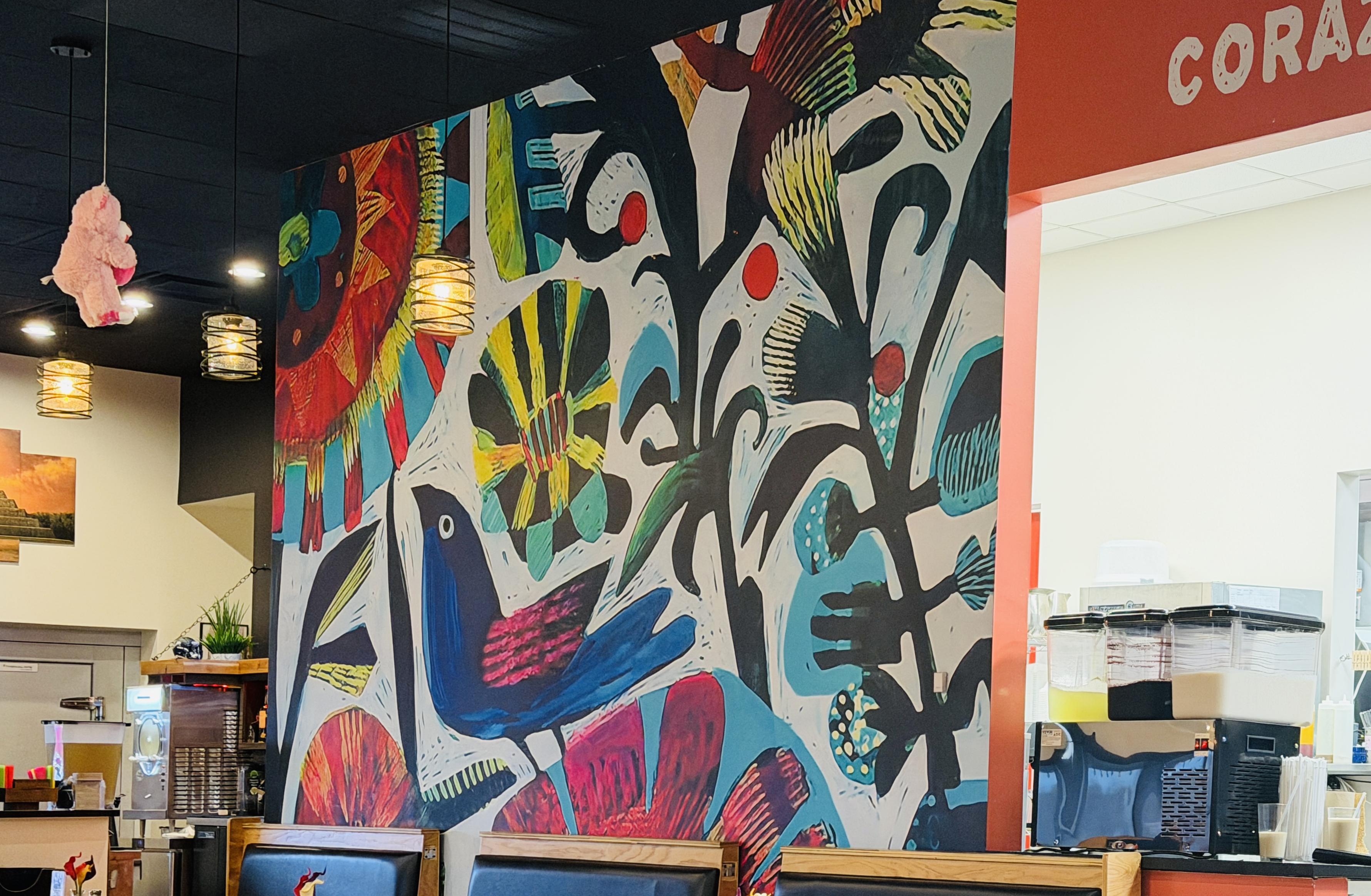 A bright mural in a Mexican restaurant