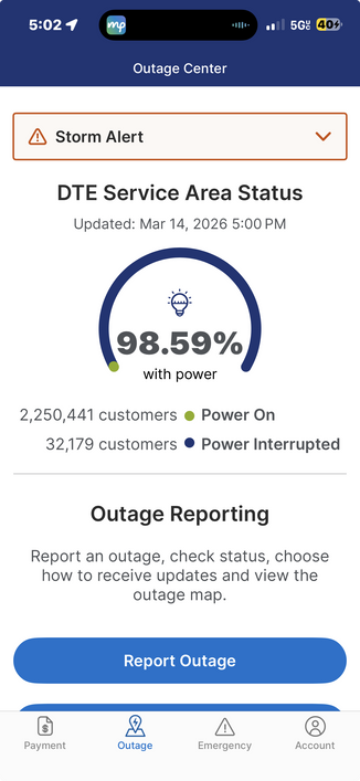 The first thing I see in the DTE app’s Outage Center. The central image is evocative of a circular gauge and it asserts that 98.59% of customers are WITH POWER.