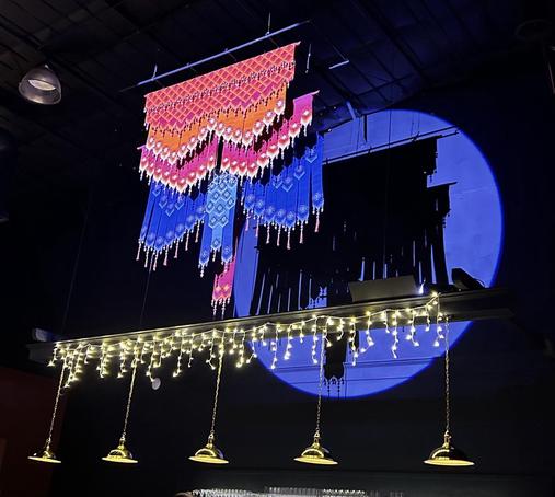 One of the Woven Birds tapestries by the late Mexican artist, Hector Jara, in the Unit B space