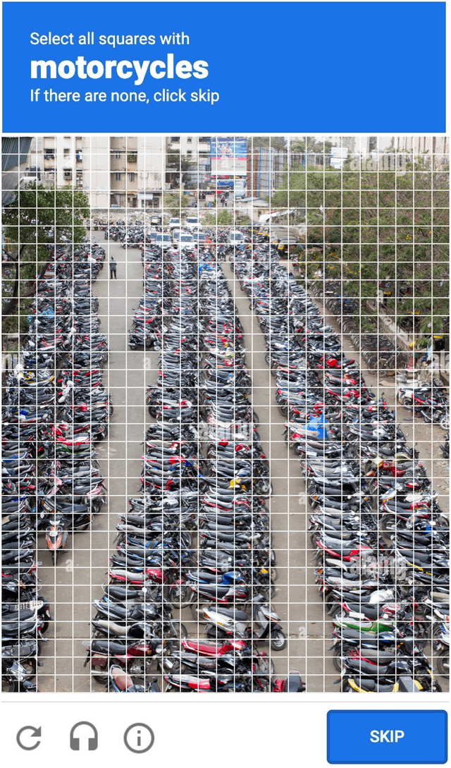 Fake CAPTCHA screen with hundreds of motorcycles and hundreds of squares.