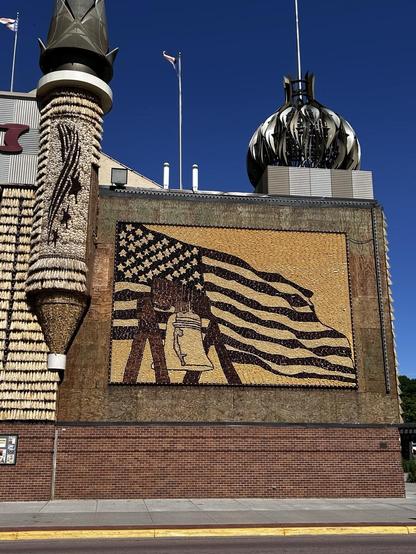 Closer view of one of the mosaics. A waving US flag with Liberty Bell.