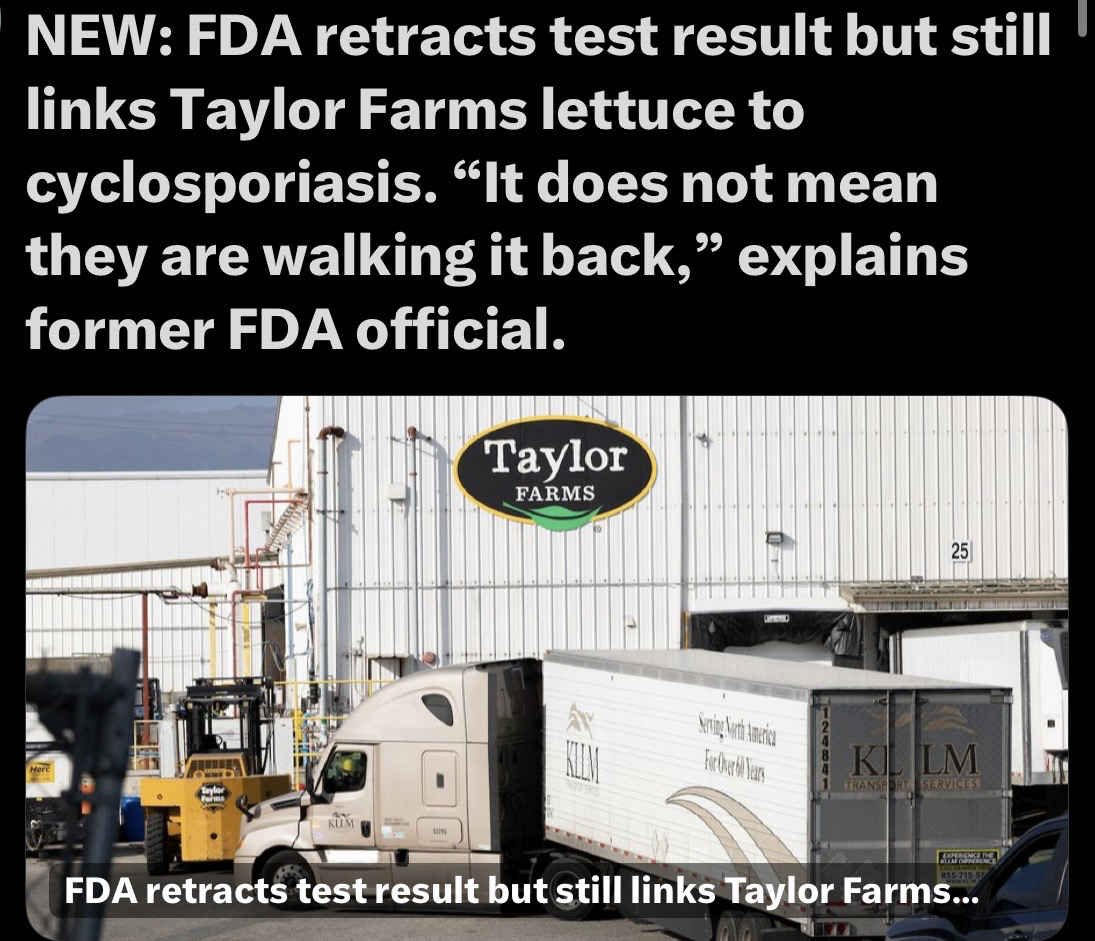 Image features a warehouse exterior labeled "Taylor Farms" with a truck and loading equipment visible in the foreground. Text highlights a retraction by the FDA regarding test results linking Taylor Farms lettuce to cyclosporiasis, citing a former FDA official's comments.