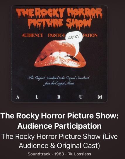 Album cover.
Black background with red lips.

THE ROCKY HORROR PICTURE SHOW

AUDIENCE PARTICI SAY IT! PATION 

The Original soundtrack to the original soundtrack from the original movie.
1983