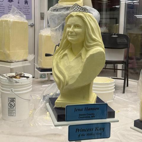 A sculpture in solid butter of Jena Hanson of Owatanna, Minnesota, chosen as Princess Kay of the Milky Way.
Sculpting tools can be seen on the side. Other butter sculptures of runners up are yet to be completed.