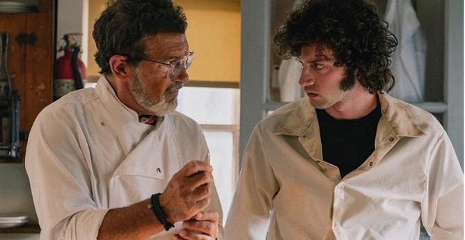 Antonio Banderas as chef and Dominic Sessa in a movie still.